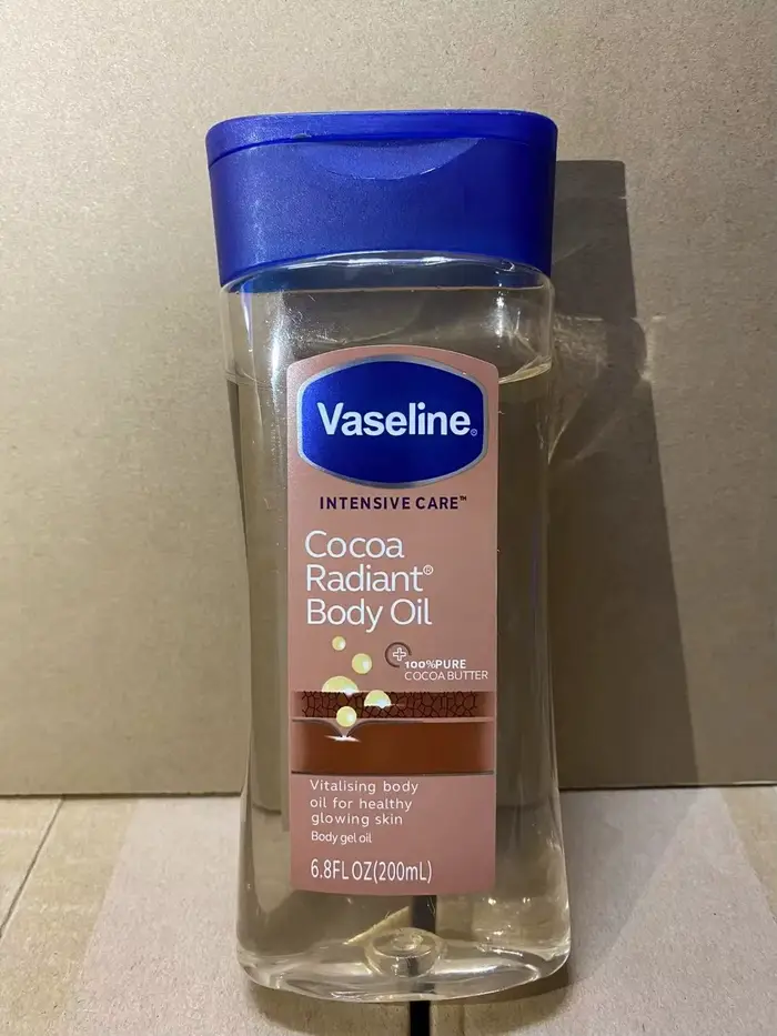 Huile Corporelle Éclatante au Cacao Vaseline 200ml – Soin Hydratant Longue Durée