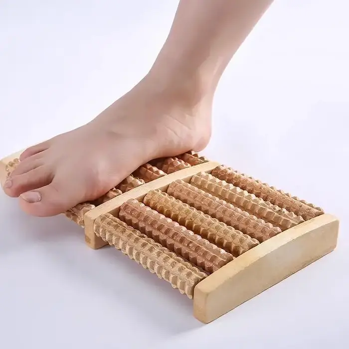 Rouleau de massage des pieds en bois à base de réflexologie