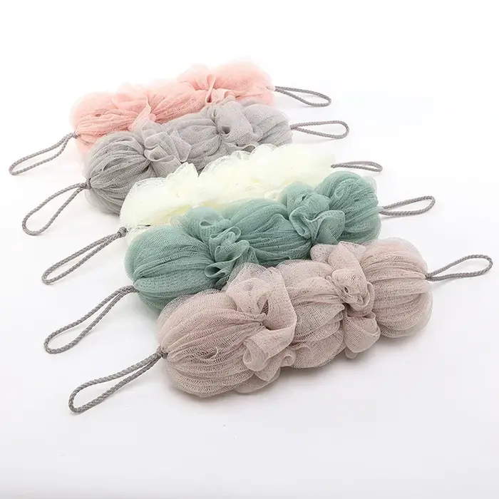 Brosse exfoliante en maille pour le corps