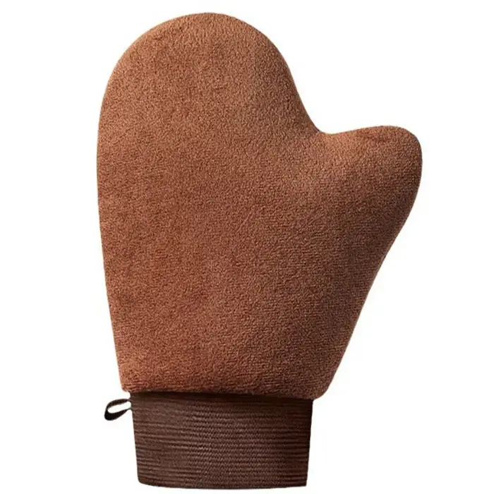Gant auto-bronzant pour le nettoyage du corps